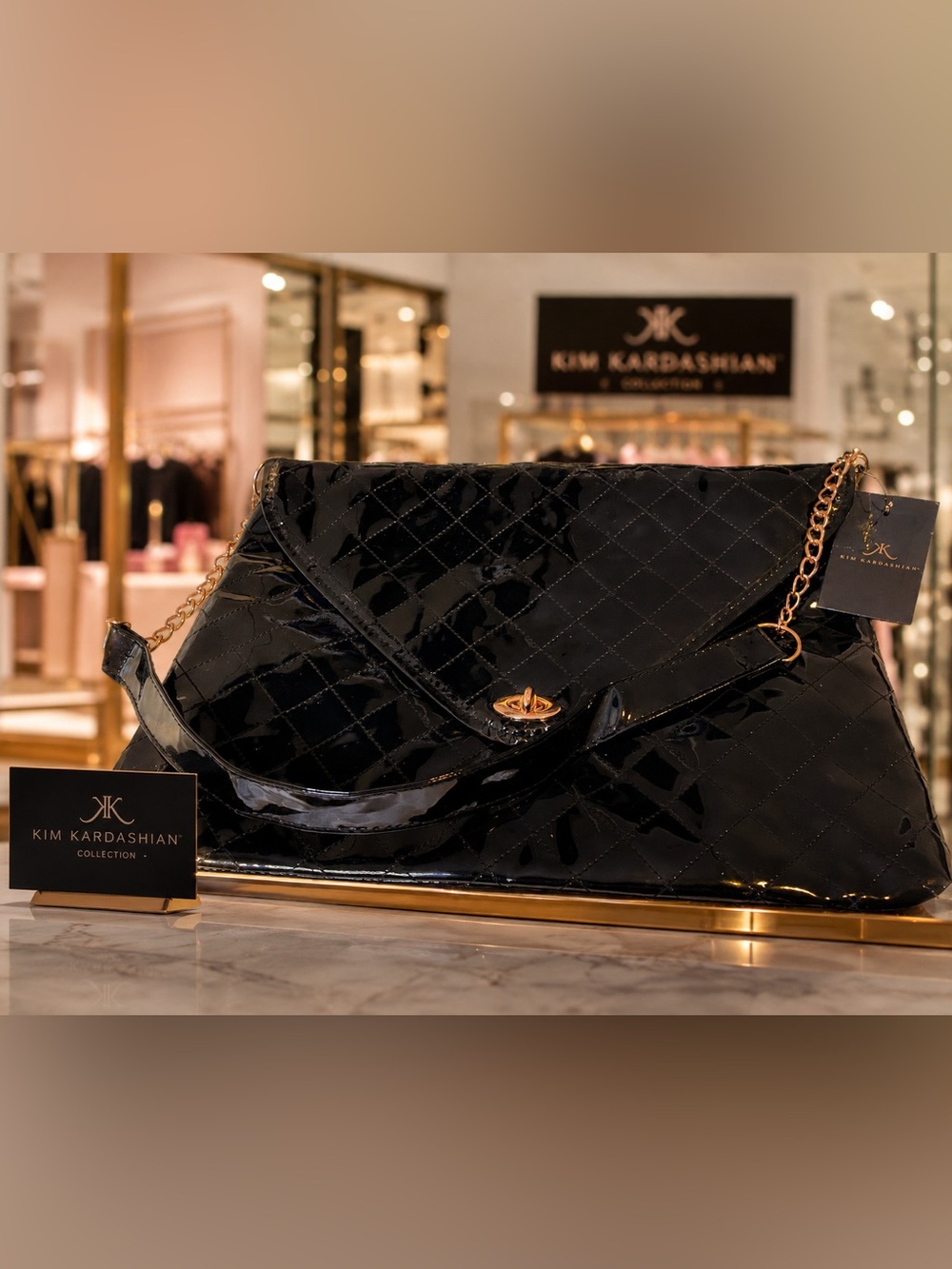 Kim Kardashian | Quilted Patent Envelope Clutch in Black with Gold Hardware